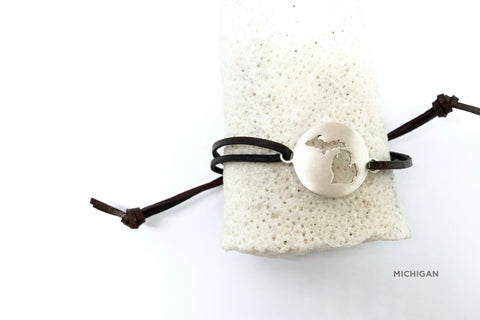 Small sterling silver Michigan medallion with matte finish