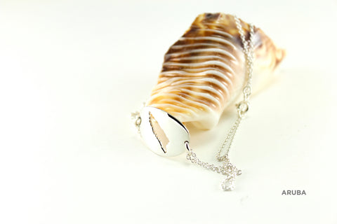 Small oval medallion with double chain bracelet shown in sterling silver with polished finish and Aruba border